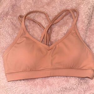 Peach pink sports bra